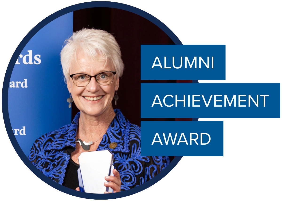Circular headshot of Lee Ann Colacioppo; text overlay reads "ALUMNI ACHIEVEMENT AWARD."