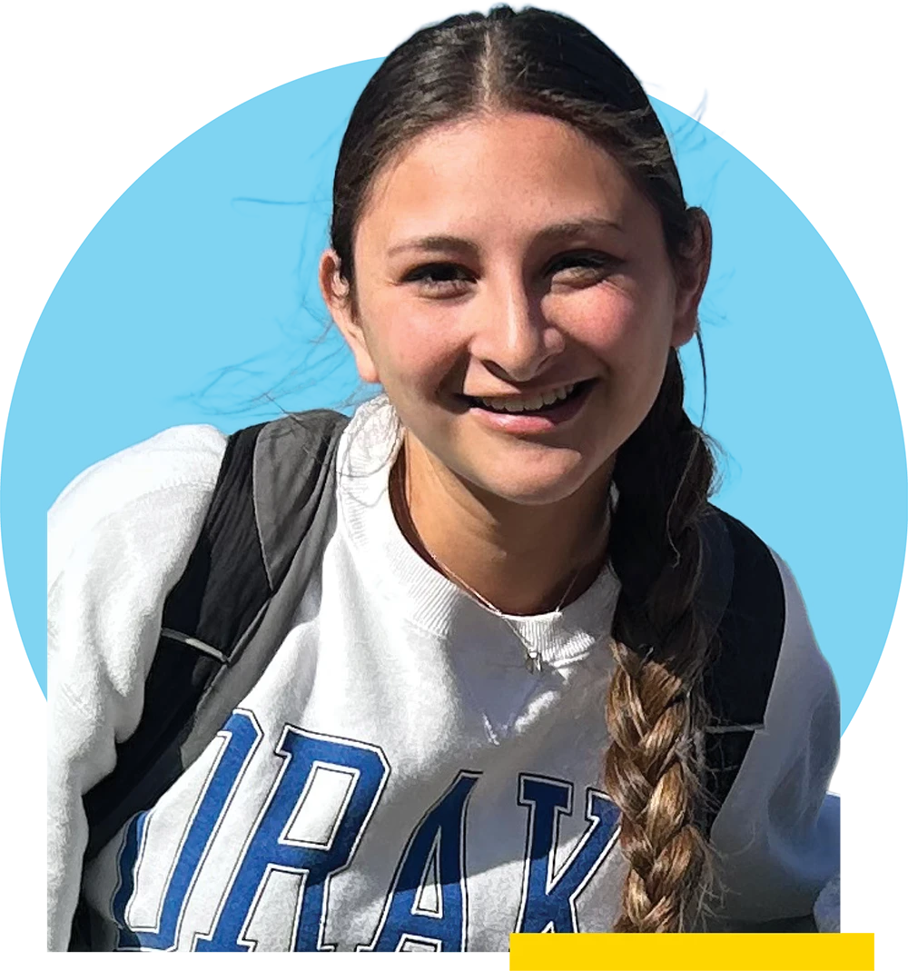 Catalina Samaniego wearing a white "Drake" sweatshirt and a backpack, set against a light blue circular background.