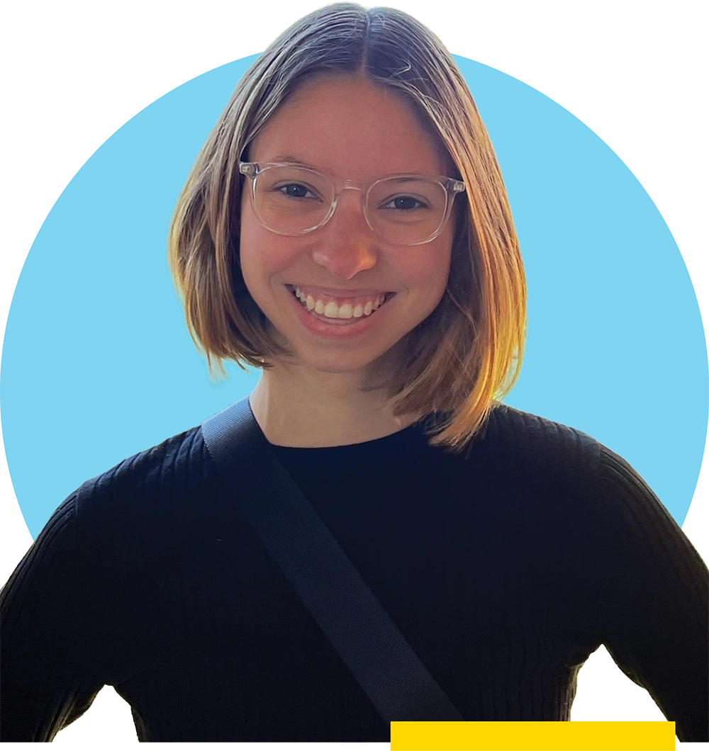 Bridgid Miller with a short bob haircut and clear-rimmed glasses wears a black ribbed top, positioned against a light blue circular backdrop.