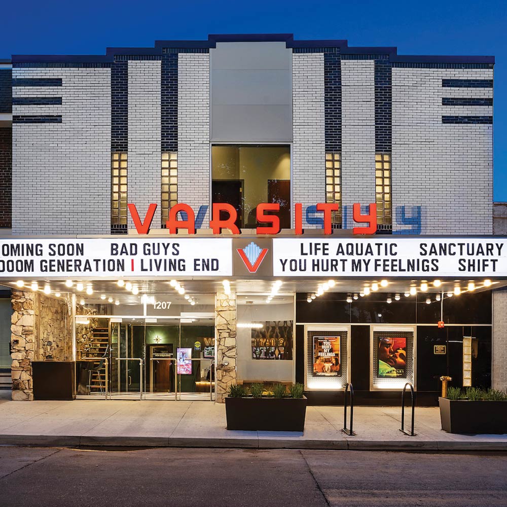 The iconic Art Deco facade of the renovated historic theater on 25th Street, which serves as a hub for film lovers in Des Moines.