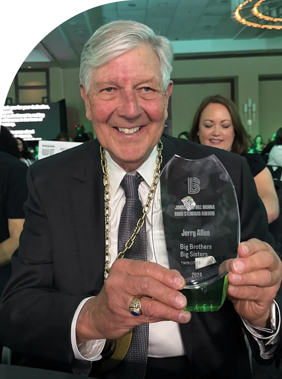 Jerry Allen holding an award