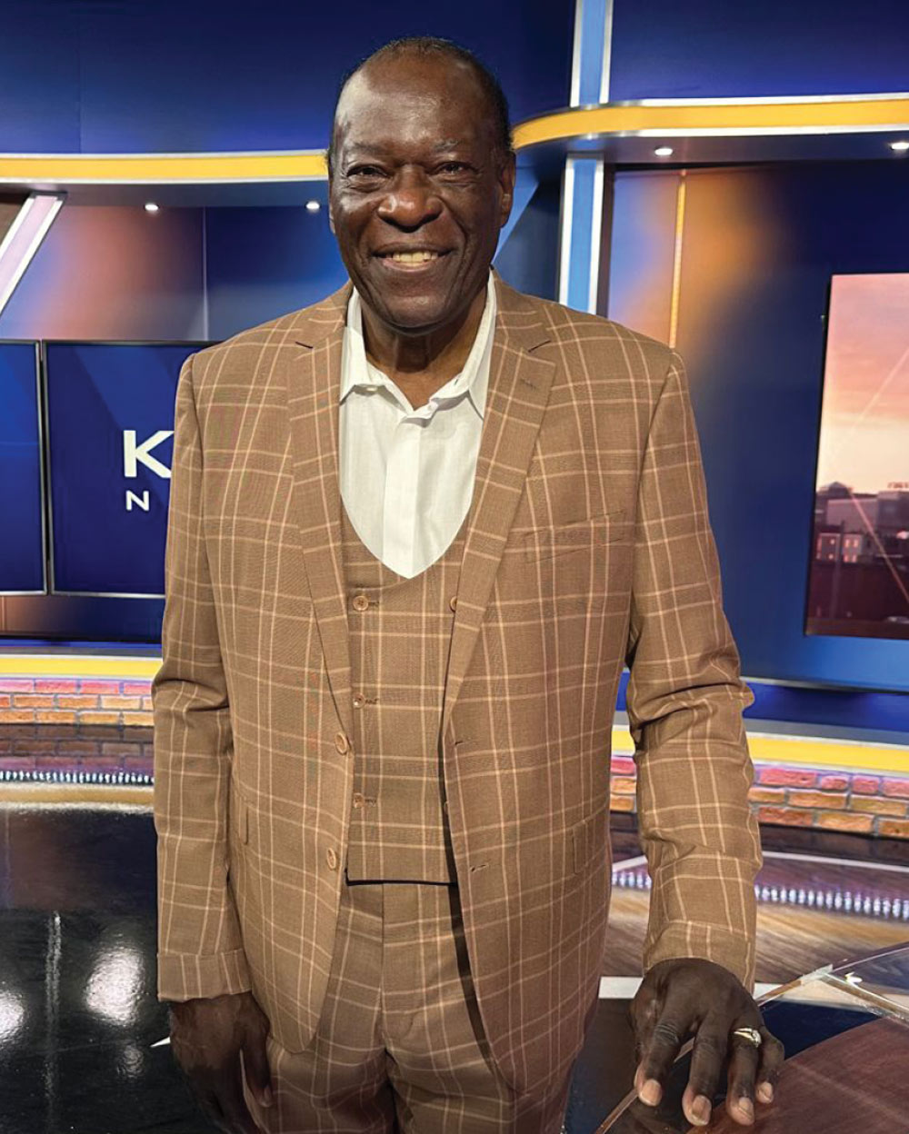 Dolph V. Pulliam on a news set