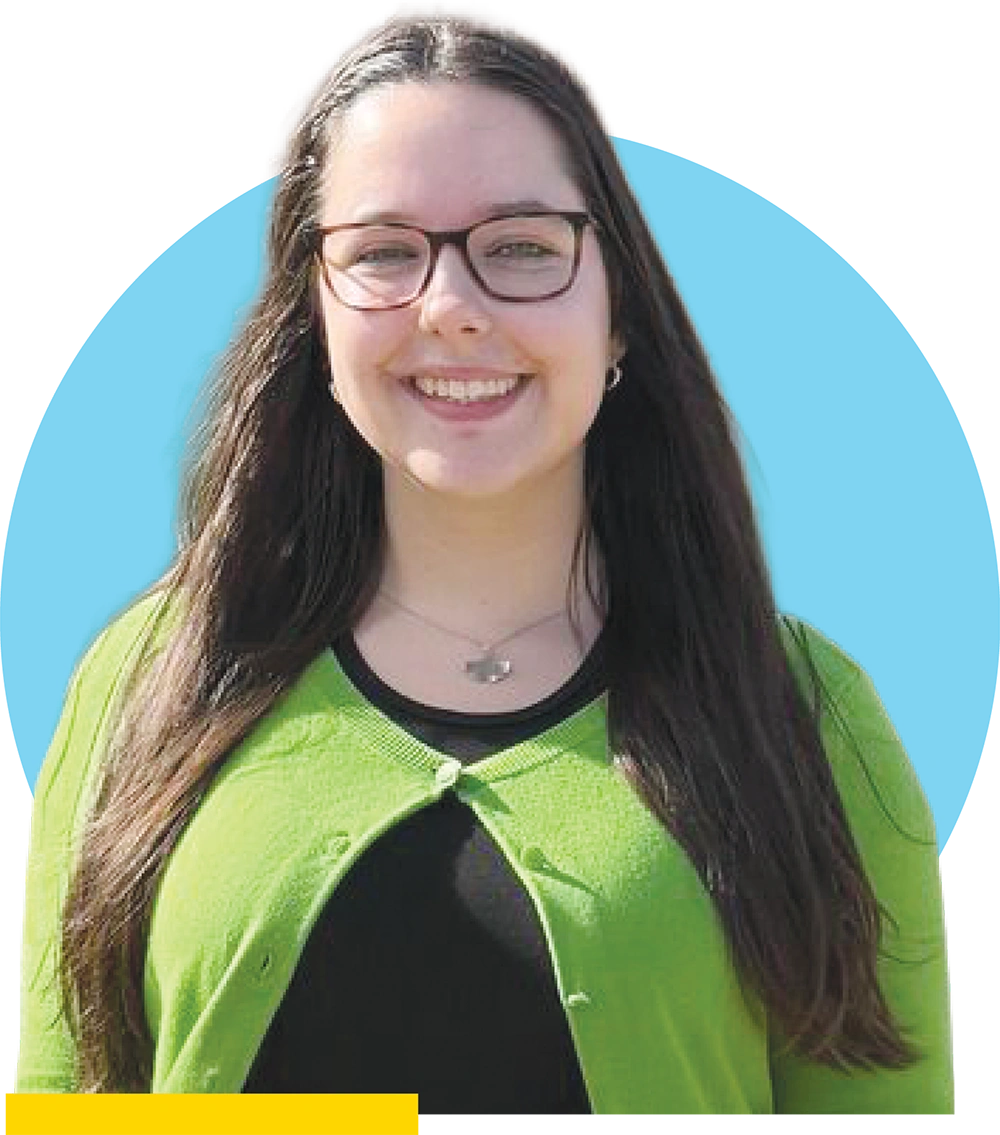 Ella Rother wearing glasses and a green cardigan over a black top against a blue circle background.