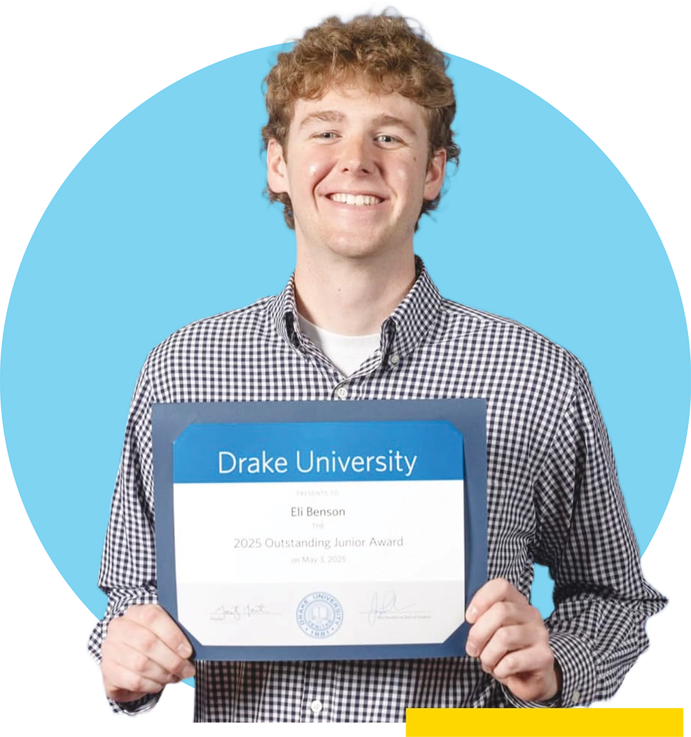 Eli Benson in a plaid shirt holds a framed Drake University award certificate against a blue circle.