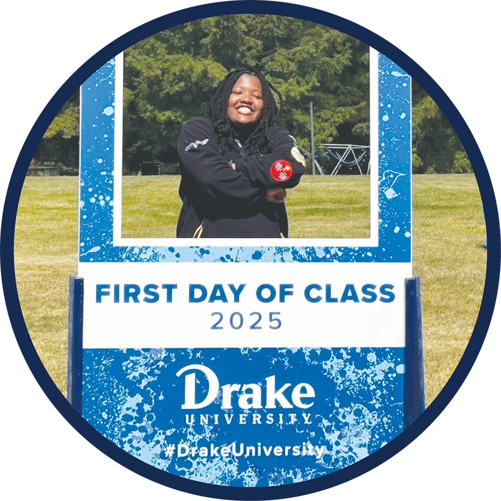 Ty Walls poses inside a "FIRST DAY OF CLASS 2025" Drake University photo frame cut-out.